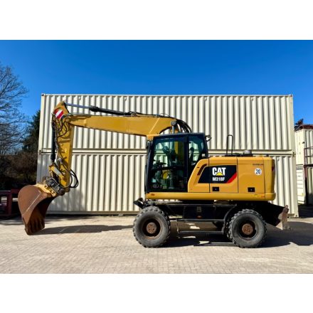Caterpillar M318 F gumikerekes kotró 8/10