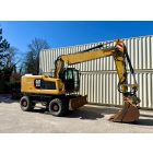 Caterpillar M318 F gumikerekes kotró 8/10